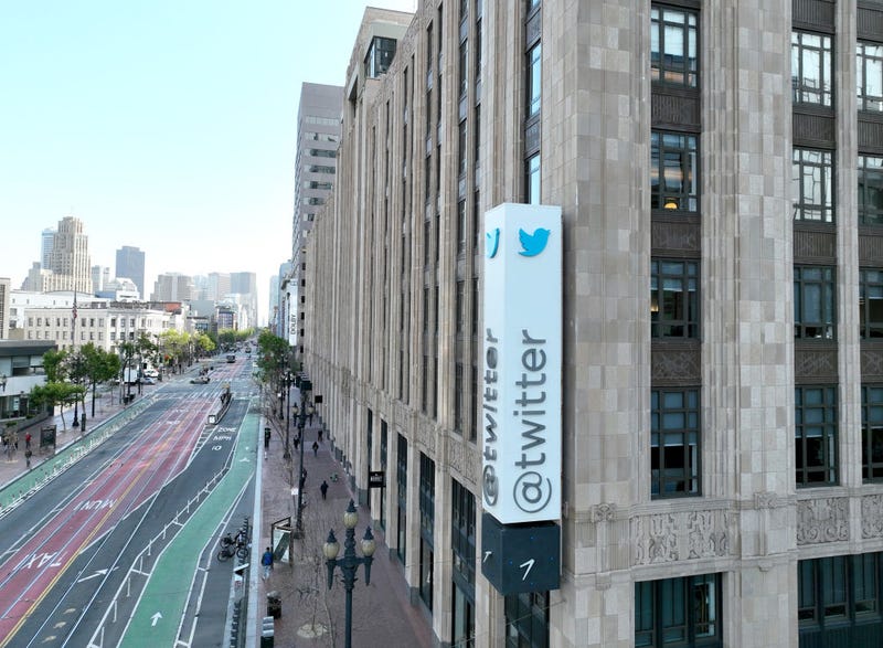n an aerial view, a sign is seen posted on the exterior of Twitter headquarters on April 27, 2022 in San Francisco, California.