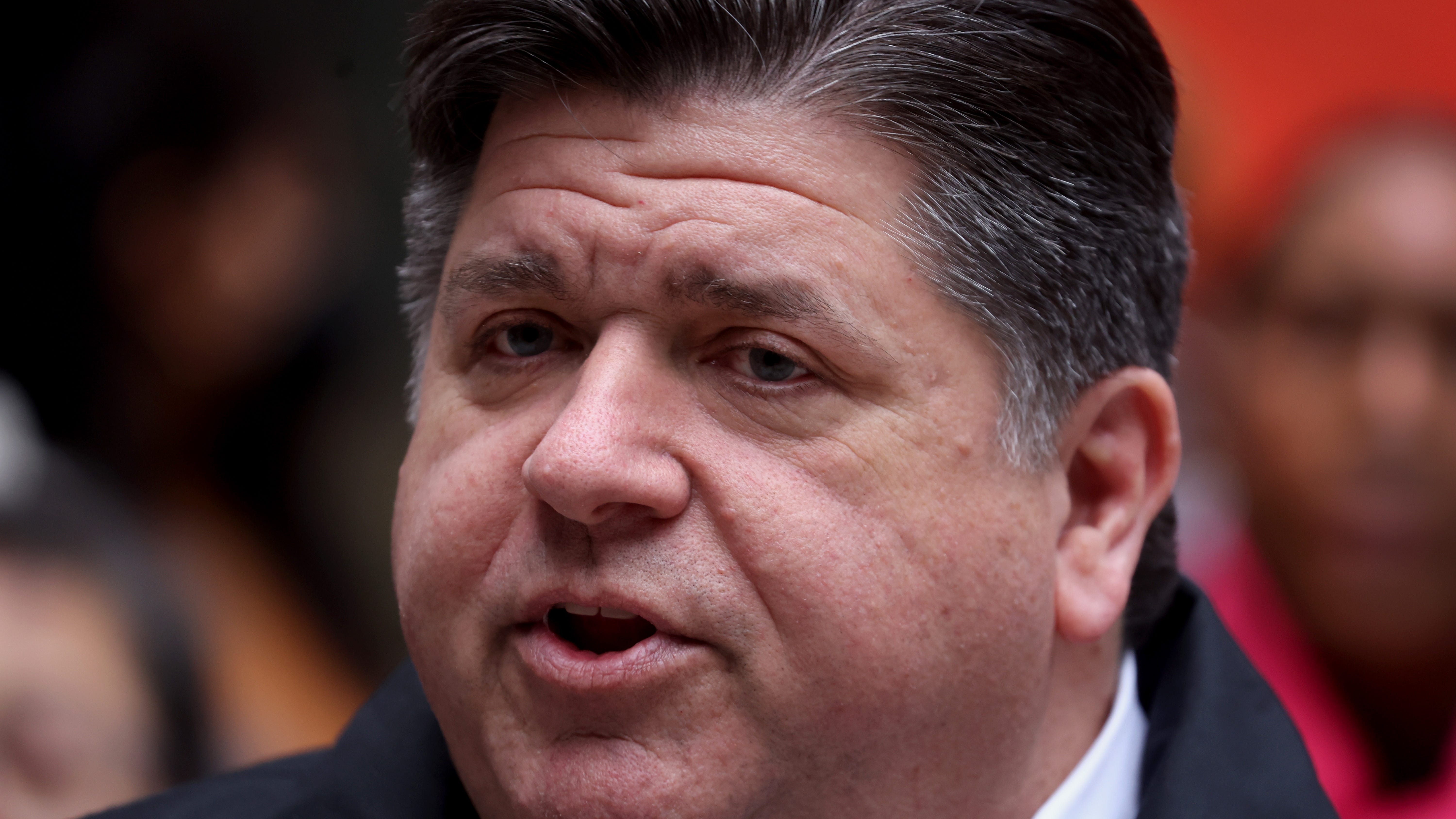 Gov. Pritzker signs revised Illinois' no cash bail law