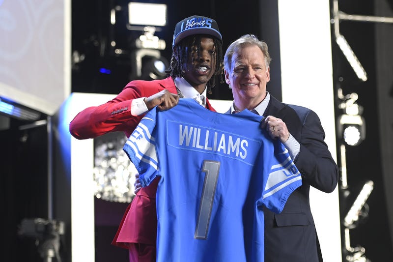Jameson Williams and Roger Goodell