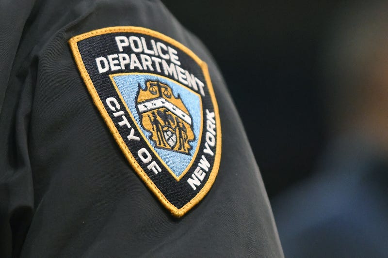 NYPD badge on sleeve