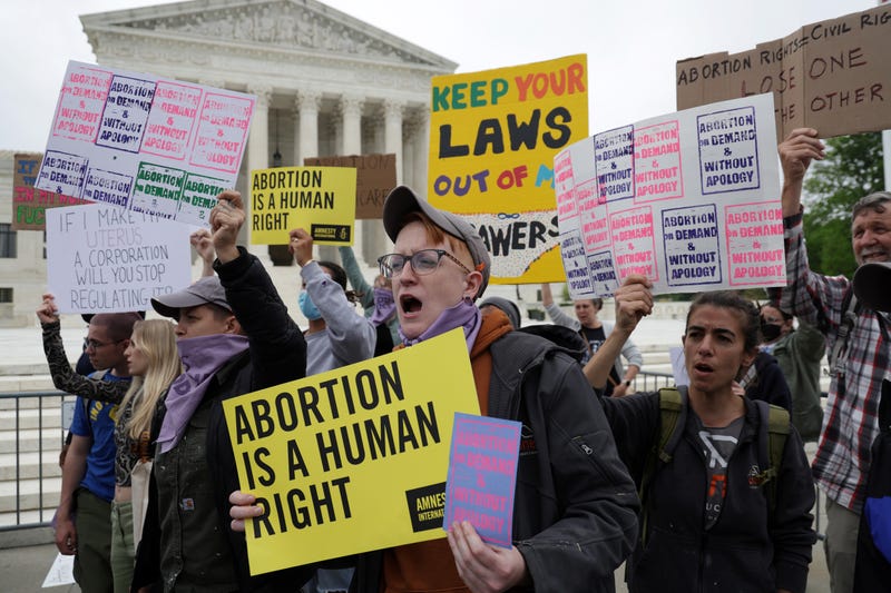 WASHINGTON, DC - MAY 03: Pro-choice activists protest in response to the leaked Supreme Court draft decision to overturn Roe v. Wade in front of the U.S. Supreme Court May 3, 2022 in Washington, DC. In a leaked initial draft majority opinion obtained by Politico and authenticated by Chief Justice John Roberts, Supreme Court Justice Samuel Alito wrote that the cases Roe v. Wade and Planned Parenthood of Southeastern Pennsylvania v. Casey should be overturned, which would end federal protection of abortion rights across the country. 