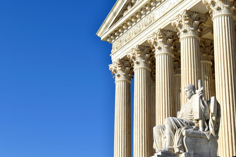 Guardian of Law seated marble figure outside the Supreme Court of the United States