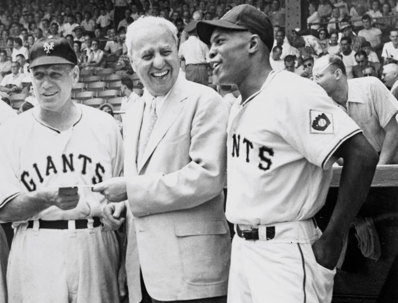Willie Mays (right) with manager and coach Leo Durocher at New York's Polo Grounds in August 1951.
