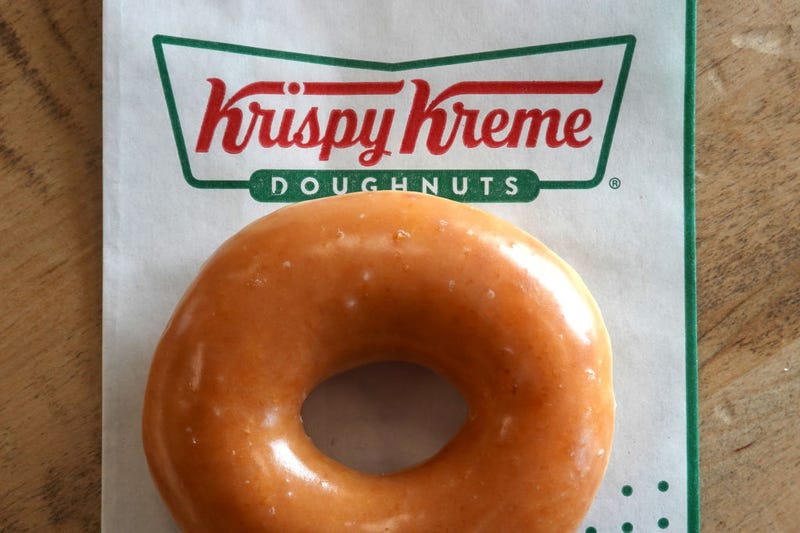 In this photo illustration, a Krispy Kreme glazed doughnut is shown on May 12, 2022 in Daly City, California. 