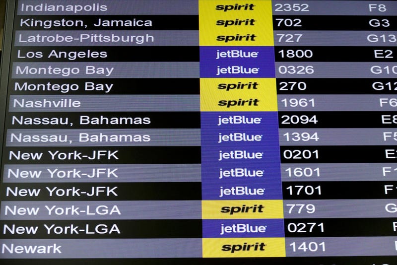 JetBlue Airlines and Spirit Airlines are seen on the departure board in the Fort Lauderdale-Hollywood International Airport on May 16, 2022 in Fort Lauderdale, Florida.