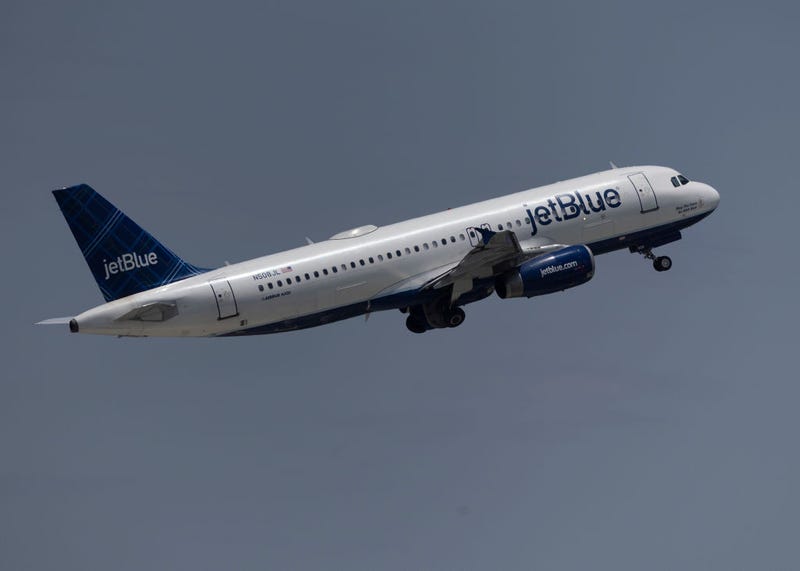 A JetBlue Airlines plane takes off from the Fort Lauderdale-Hollywood International Airport on May 16, 2022 in Fort Lauderdale, Florida.