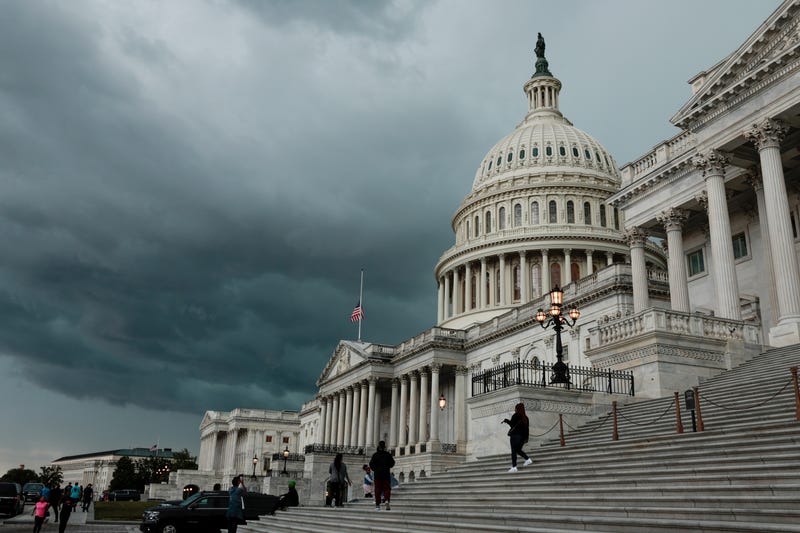 A storm cloud hangs over the U.S. Capitol Building on May 16, 2022, in Washington, DC.