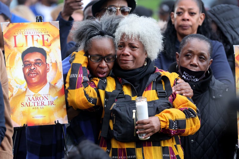 People participate in a vigil to honor the 10 people killed in Saturday's shooting at Tops market on May 17, 2022 in Buffalo, New York. A gunman opened fire at the store killing ten people and wounding another three. The attack targeted Black people.