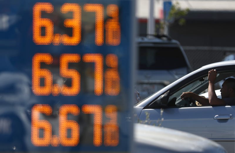 A driver passes a sign with gas prices over $6.00 per gallon on May 20, 2022 in San Rafael, California.