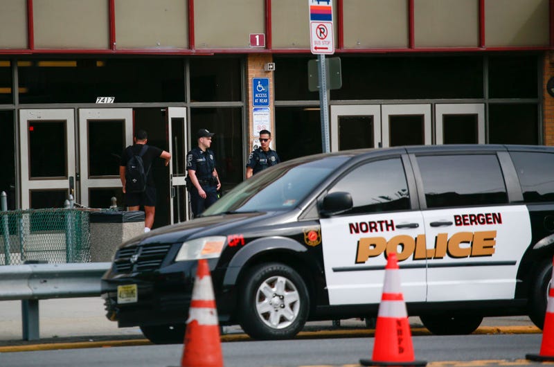 Police officers guard outside a high school on May 26, 2022 in North Bergen, New Jersey.  