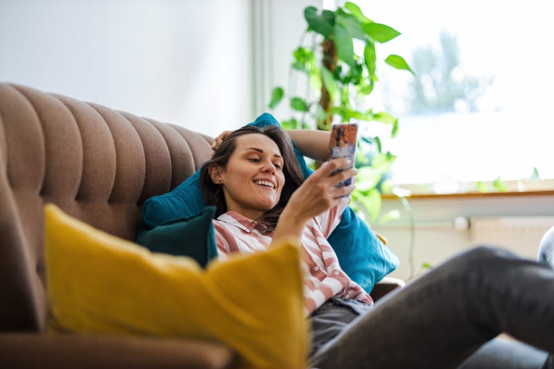 FILE: Woman using a smartphone