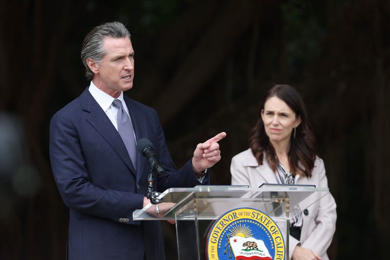 California Gov. Gavin Newsom (L) speaks as New Zealand Prime Minister Jacinda Ardern looks on during a news conference on May 27, 2022 in San Francisco, California.