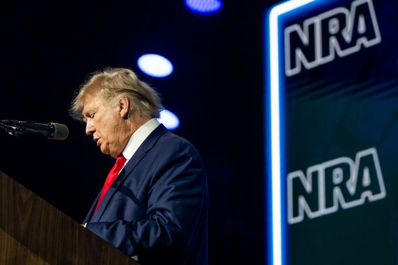 Former U.S. President Donald Trump reads the names of the victims of the Uvalde mass shooting during the National Rifle Association (NRA) annual convention on May 27, 2022 in Houston, Texas. The annual National Rifle Association comes days after the mass shooting in Uvalde, Texas which left 19 students and 2 adults dead, with the gunman fatally shot by law enforcement officers. (Photo by Brandon Bell/Getty Images)