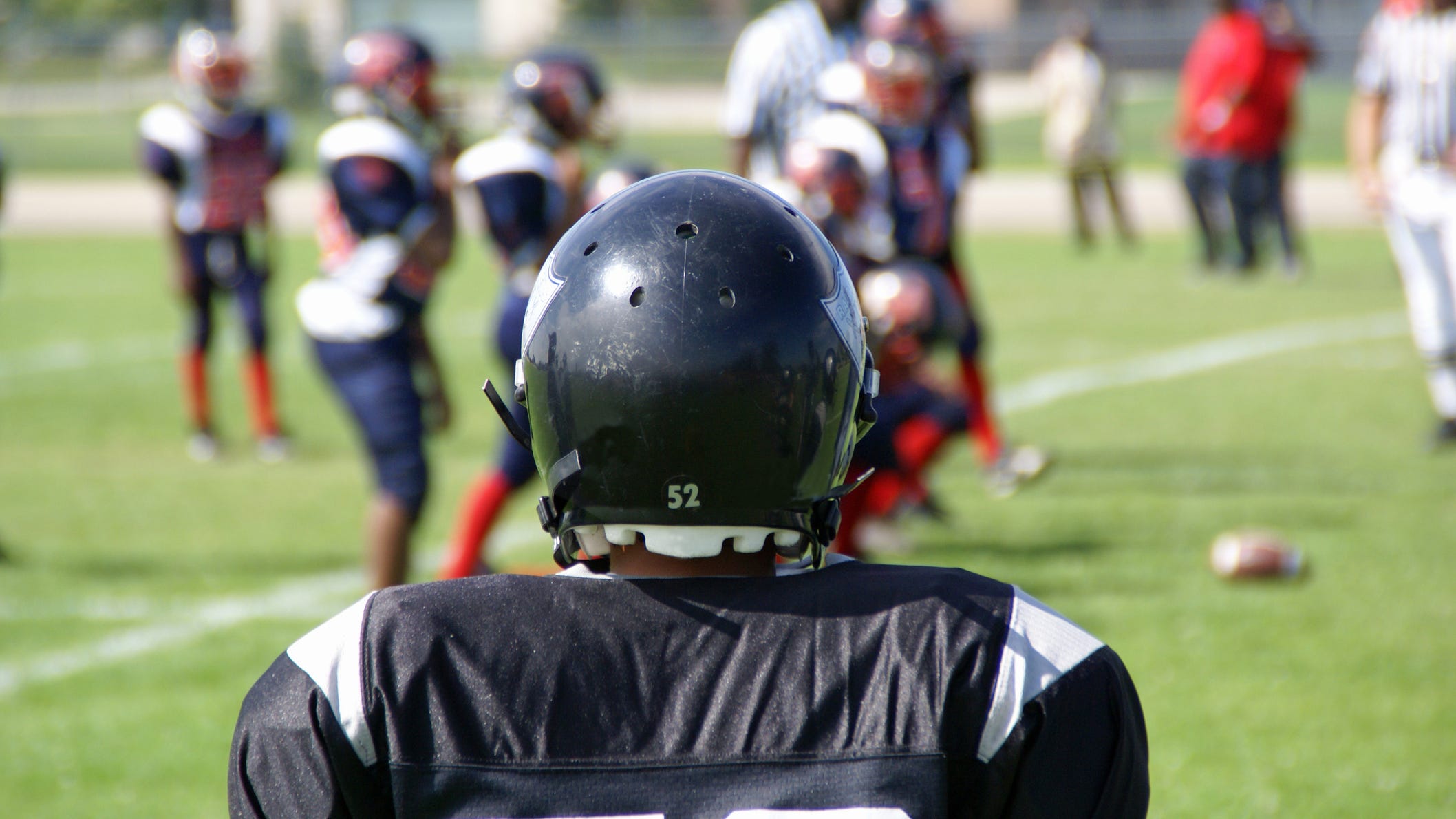 Angry mom goes after 12-year-old player who tackled her son