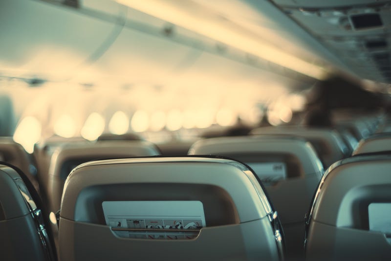 Empty airline cabin stock photo.