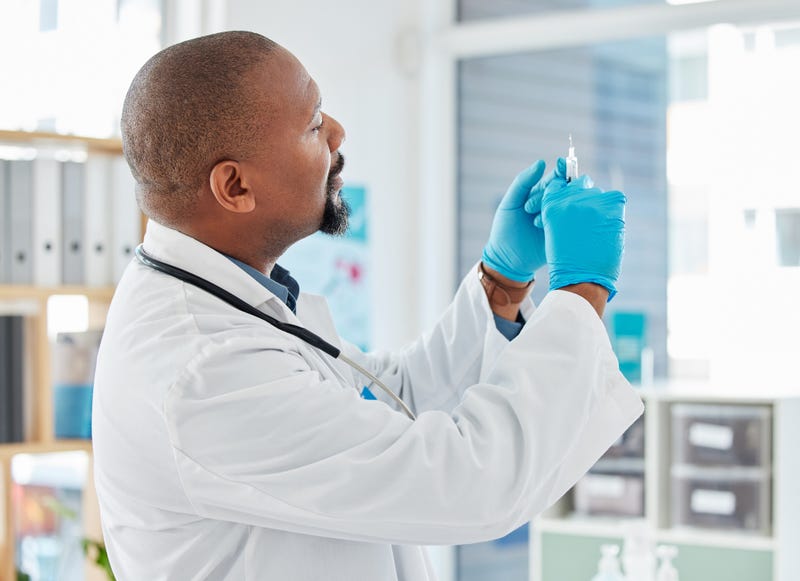 A doctor with a flu vaccine.