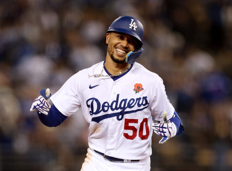 Mookie Betts #50 of the Los Angeles Dodgers celebrates his solo homerun as he runs the bases, to trail 4-2 to the Pittsburgh Pirates.