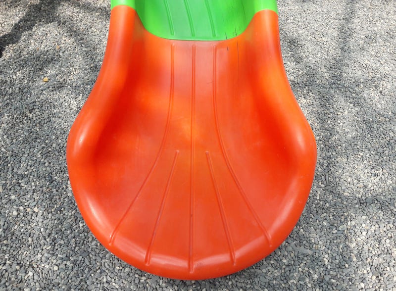 Children's playground slide closeup.