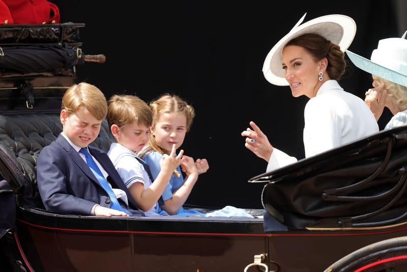 Catherine, Duchess of Cambridge, Prince George of Cambridge, Prince Louis of Cambridge and Princess Charlotte of Cambridge ride in a carriage during the Trooping the Colour parade at Buckingham Palace on June 02, 2022 in London, England