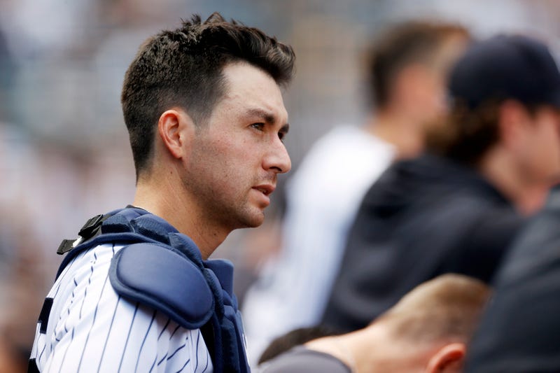 Kyle Higashioka #66 of the New York Yankees looks on from the dugout during the fourth inning against the Detroit Tigers at Yankee Stadium on June 04, 2022 in the Bronx borough of New York City.