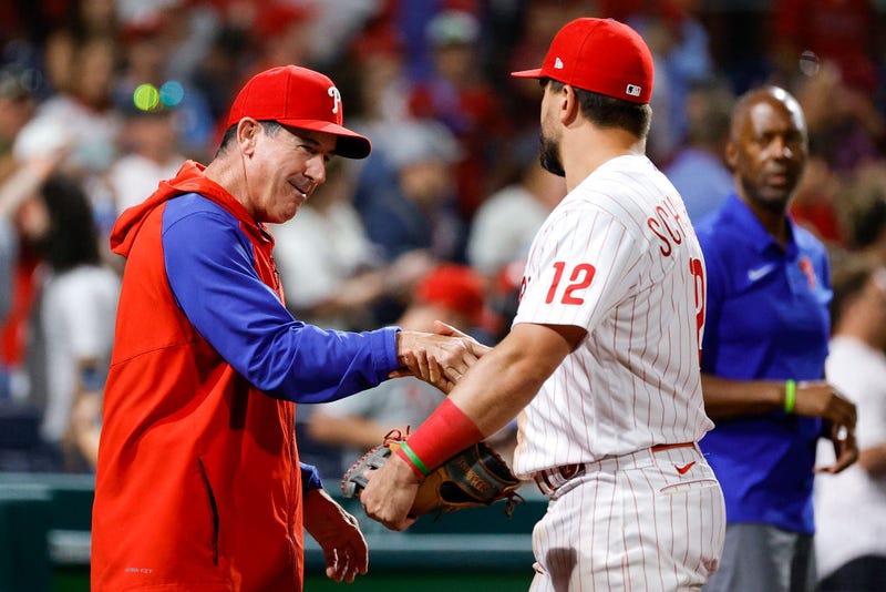 Interim manager Rob Thomson and Kyle Schwarber, #12 of the Philadelphia Phillies, celebrate after defeating the Los Angeles Angels at Citizens Bank Park on June 4, 2022, in Philadelphia, Pennsylvania.