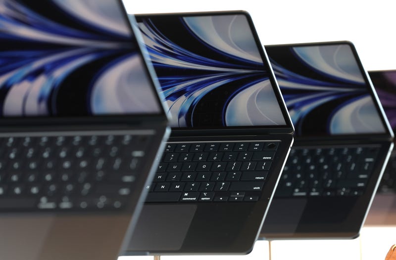 Newly redesigned MacBook Air laptops are seen displayed during the WWDC22 at Apple Park on June 06, 2022 in Cupertino, California.