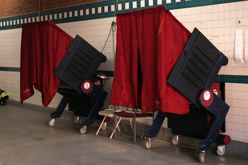 Empty voting booths are seen at a New Jersey fire station. 12 congressional districts in the state will see general elections on Nov. 8. 