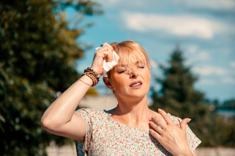 Woman in hot weather. 