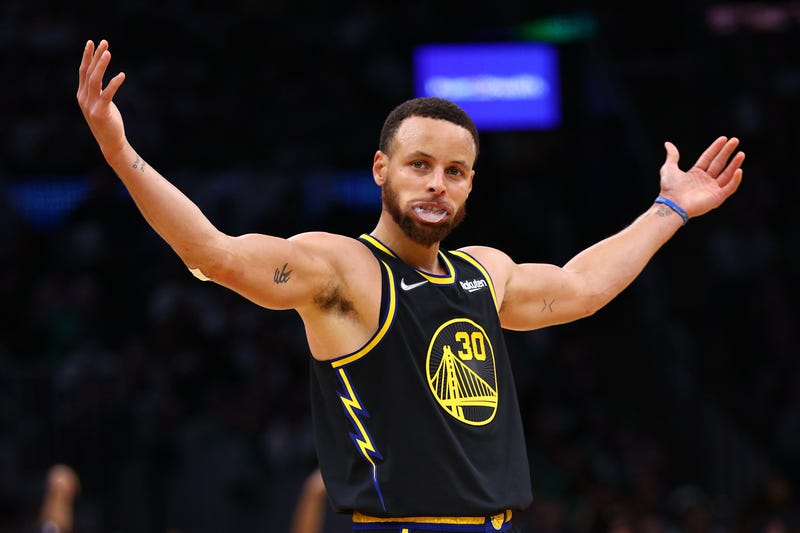  Stephen Curry #30 of the Golden State Warriors celebrates a three point basket in the third quarter against the Boston Celtics during Game Four of the 2022 NBA Finals at TD Garden.