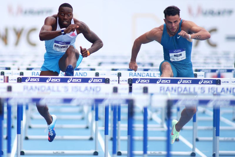 Grant Holloway of the USA (left) competes against Devon Allen in the men's 110-meter hurdle during the New York Grand Prix at Icahn Stadium on June 12, 2022, in New York City. 