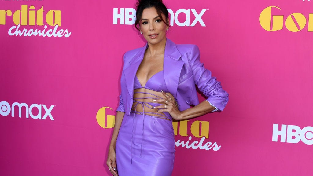 Eva Longoria, 47, outshines the sun while basking poolside in bright yellow bikini