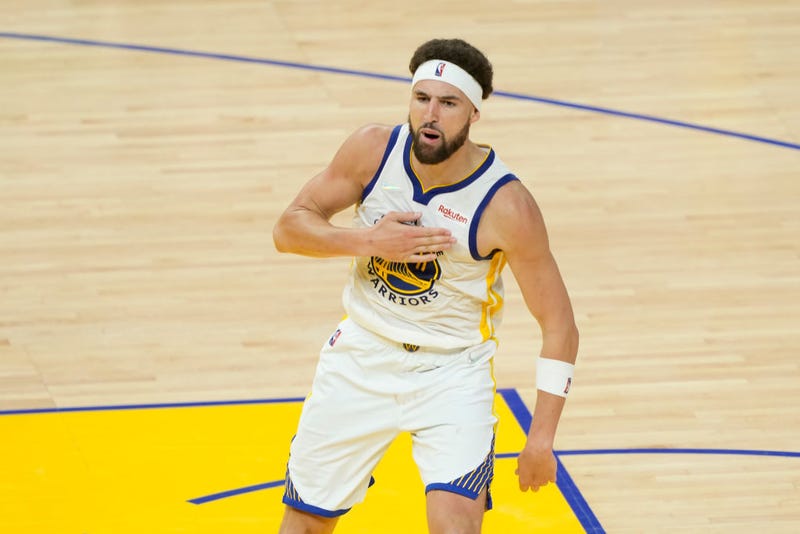  Klay Thompson #11 of the Golden State Warriors celebrates a three point basket during the fourth quarter against the Boston Celtics in Game Five of the 2022 NBA Finals at Chase Center on June 13, 2022 in San Francisco, California.