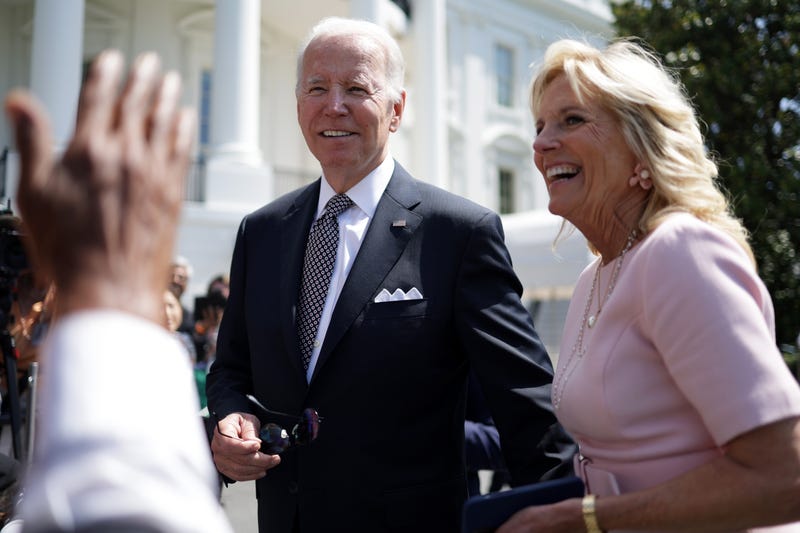U.S. President Joe Biden speaks to members of the press as first lady Jill Biden looks on prior to a Marine One departure from the White House on June 17, 2022, in Washington, D.C. 