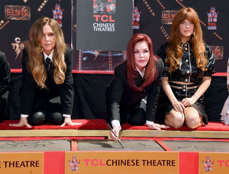  (L-R) Lisa Marie Presley, Priscilla Presley, and Riley Keough attend the Handprint Ceremony honoring Priscilla Presley, Lisa Marie Presley And Riley Keough at TCL Chinese Theatre on June 21, 2022 in Hollywood, California.