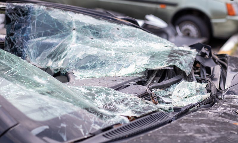 Close up of a smashed window from a car crash.