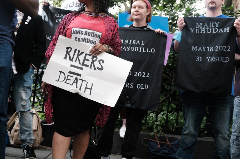 Family members, activists and others hold a rally outside of City Hall to demand that the administration of Mayor Eric Adams do more to address the crisis in living conditions at the Rikers Island Jail on June 23, 2022.