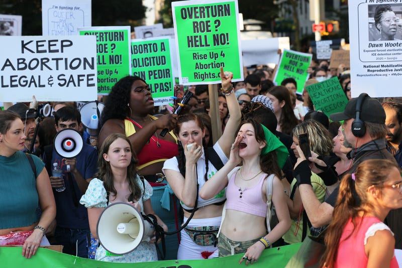 People gather to protest the Supreme Courts 6-3 decision in the Dobbs v. Jackson Women’s Health Organization at Washington Square Park.
