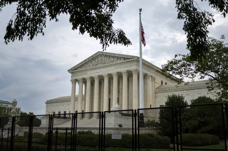 Fencing surrounds the U.S. Supreme Court as it nears the end of its term, June 27, 2022 in Washington, DC.
