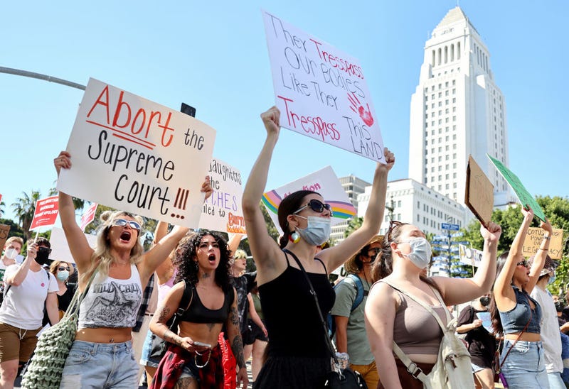 Abortion rights supporters march past City Hall while protesting against the recent U.S. Supreme Court decision to end federal abortion rights protections on June 27, 2022 in Los Angeles, California.