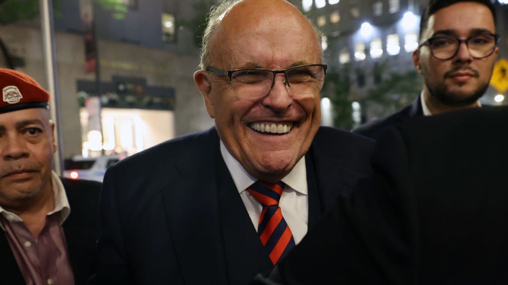 Giuliani unlikely to face charges in NY probe, quotes Yogi Berra: 'It ain't over til it's over'
