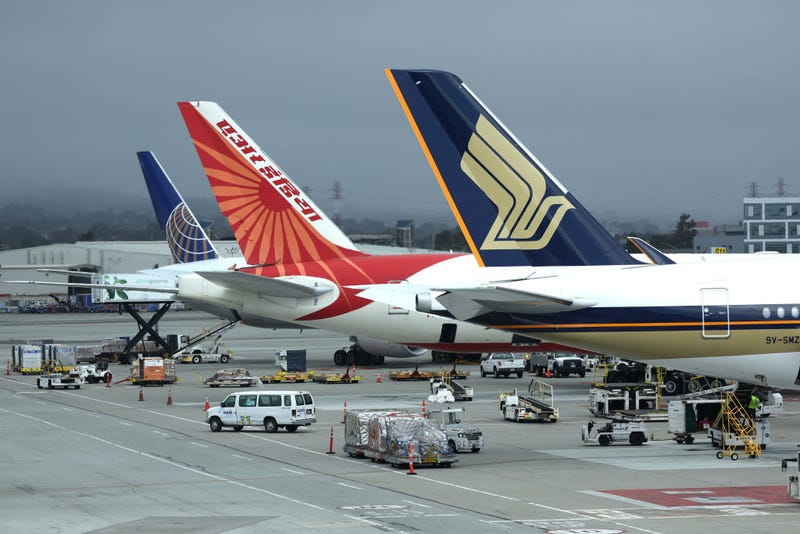 Planes sit parked at their gates at San Francisco International Airport on July 01, 2022 in San Francisco, California. 