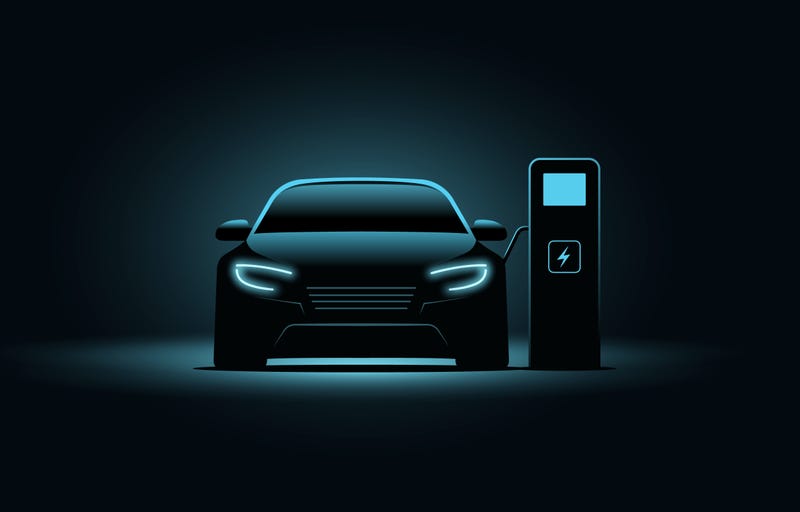 A Electrify America Charging Station for electric vehicles is seen at Westfield Old Orchard shopping center in Skokie, Ill., Jan. 29, 2023. The Biden administration will propose new automobile pollution limits this week that would require at least 54% of new vehicles sold in the U.S. to be electric by 2030, ramping up quickly to as high as 67% by 2032. That's according to three people briefed on the plan.