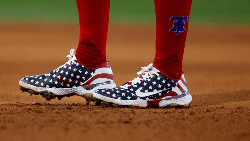 The cleats of Rhys Hoskins of the Philadelphia Phillies are seen during the fifth inning against the St. Louis Cardinals at Citizens Bank Park on July 3, 2022 in Philadelphia, Pennsylvania.