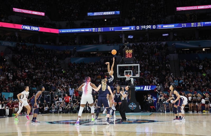 Opening jump ball of thee 2022 NCAA women's basketball national championship game, featuring UConn and South Carolina, at Minneapolis, 4/3/22