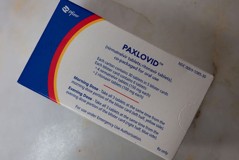 In this photo illustration, a box of Pfizer's Paxlovid is displayed on July 07, 2022 in Pembroke Pines, Florida.