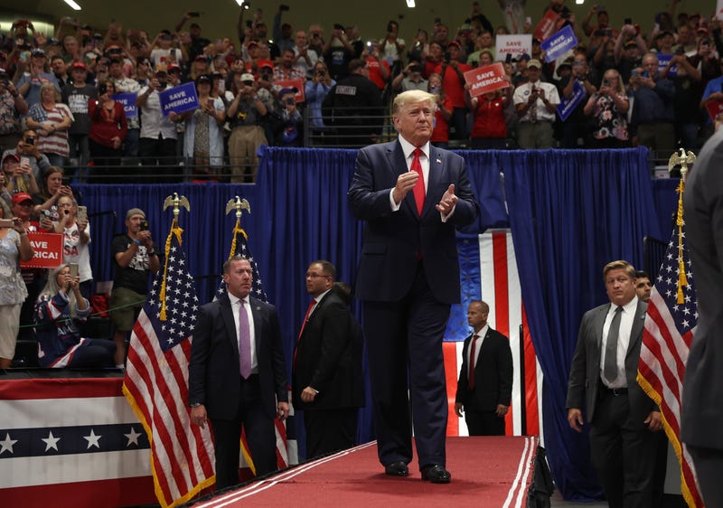 Former U.S. President Donald Trump greets supporters during a "Save America" rally at Alaska Airlines Center on July 09, 2022 in Anchorage, Alaska.