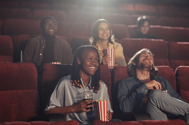 People enjoying a movie. 