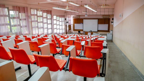 A college is offering upperclassmen $10,000 to not come to class