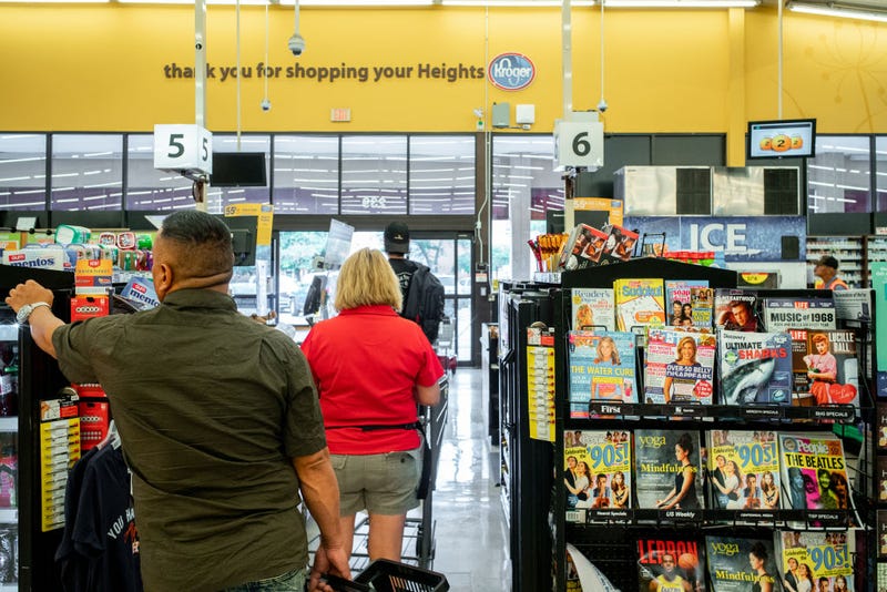 Customers wait in line at a Kroger grocery store on July 15, 2022 in Houston, Texas. 