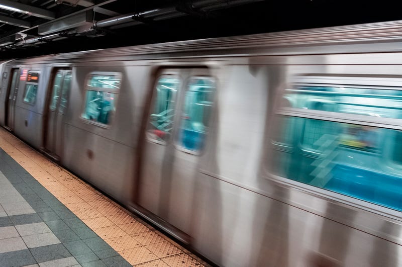 A man was found dead between two E train cars in Jamaica on Tuesday night